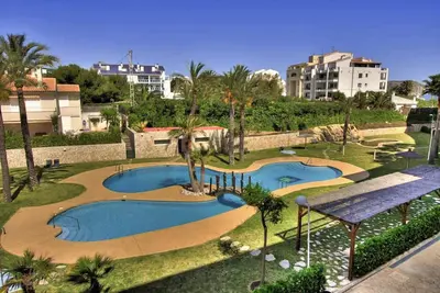 Image de Appartement Javea à dormir 4 personnes, air conditionné, salle de gym, court de paddle, ping-pong et piscine