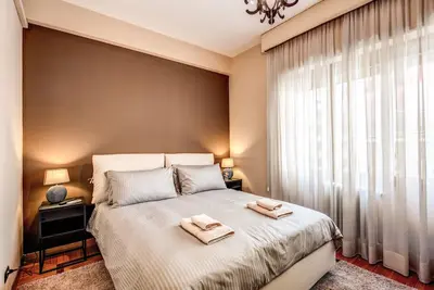 Image de Bel appartement près de San Pietro. Confortable, silencieux, Wi-Fi, accessoires.