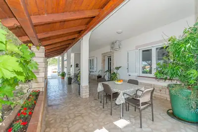 Image de Appartement de deux chambres avec la terrasse et la vue sur le mer Stara Novalja, Pag (A-6319-g)