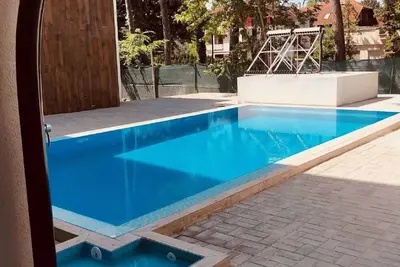 Image de Appartement de vacances 100m du lac Balaton avec piscine et air conditionné