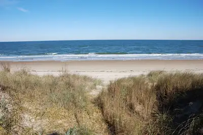 Image de Appartement rustique au bord de la plage - Confortable et directement sur la plage - 2 Br 2 apt.