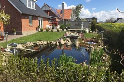 Image de Charmante petite maison près du port de Sillerslev et de la plage de Sillerslev.