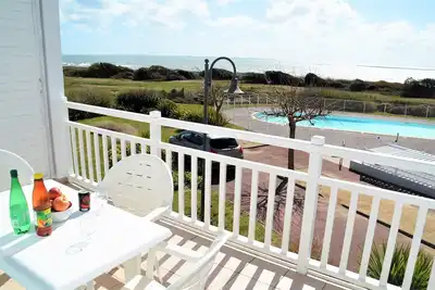 Image de Appt C103- Apt Front de mer, 2 piscines chauffées, résidence familiale