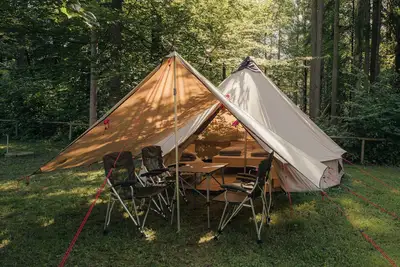 Rent a family Bell family fully equipped tent with real beds in nature.