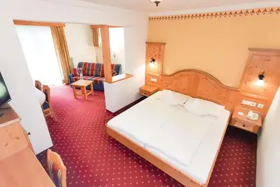 Image de Chambre Familiale Confort | Terrasse 38m² - Angerwirt, hôtel familial et vitalité