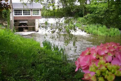 Image de Gite dans un Moulin surplombant la rivière entouré d'un écrin de verdure