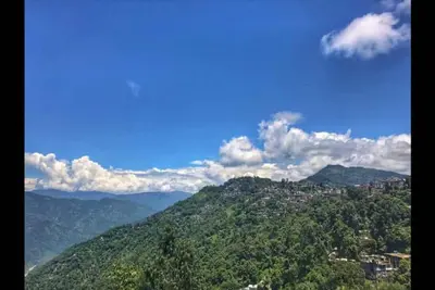 Image de Chambre Quadruple avec Vue sur la Montagne et le Soleil - The Atrium Park Homestay -Inde