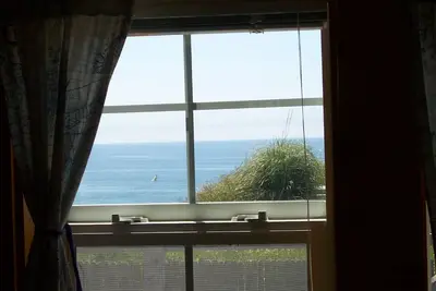 Image de Genre Maison Strawberry Point A la Nouvelle-Angleterre avec vue sur océan