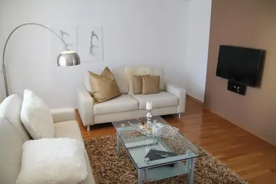 Image de Grand appartement avec balcon et sauna dans la maison