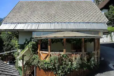 Image de Apartma Torkar - Emplacement attrayant sous la falaise massive, il y a une cascade. . . .