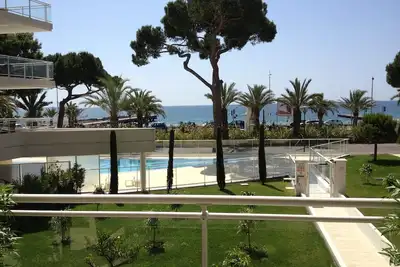 Image de Royal palm avec piscines : Appartement avec terrasse, vue mer et jardin