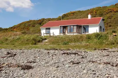 Image de Le Haven niché dans un cadre idyllique au bord de Luce Bay à Galloway un