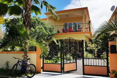 Image de Case Latanier : One bedroom, living room, private kitchen and balconies.
