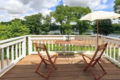 Image de Appartement \"Zum See\" vue directe sur le lac et sur le Dressurviereck