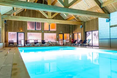 Image de Appart charmant, 30 minutes des thermes | Accès piscine + Ski Nordique!
