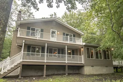 Image de Plan d'étage ouvert de 3 chambres avec vue panoramique sur le lac