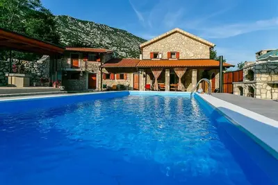 Image de Maison de vacances Drivenik pour 2 - 8 personnes avec 4 chambres à coucher - Maison de vacances