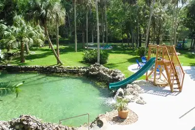 Image de Waterfront Homosassa Home w / Lagoon, Large Deck, Dock, Fire Pits & Waterslide!
