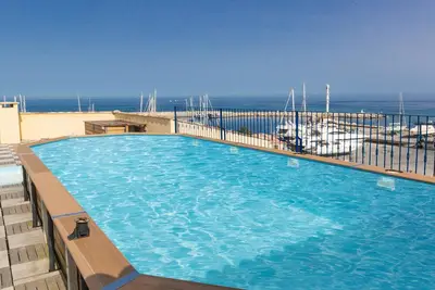 Image de Proche de la plage | Appart Modeste avec Piscine sur le Toit