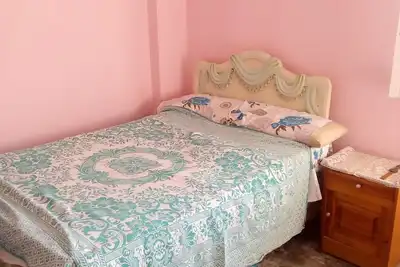 Image de Ma propriété est une maison dans un immeuble et je suis au premier étage.