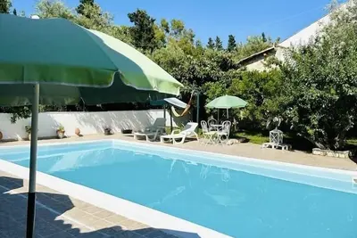 Image de Appartement dans villa avec piscine et vue panoramique