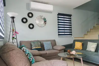 Image de Belle maison en condo privé près de la plage