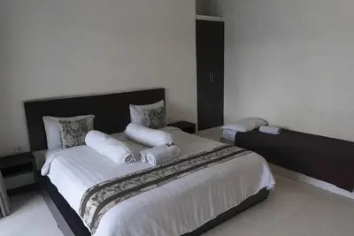 Image de Chambre pour 3 personnes avec douche à l'italienne à effet pluie