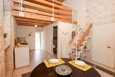 Image de La terrasse avec vue sur les oliviers - loft Moresca