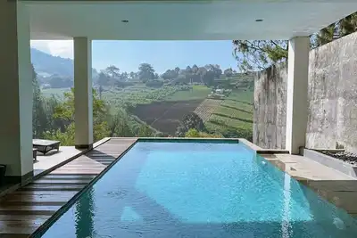 Image de Villa 4 chambres avec piscine et vue sur la montagne Dago