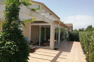 Image de Spacieuse villa d'angle toute climatisée, vue sur la réserve, Wifi inclus, véranda et gde. . .