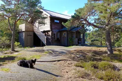 Image de Charmante Maison En Bois Dans L’Archipel De Stockholm.