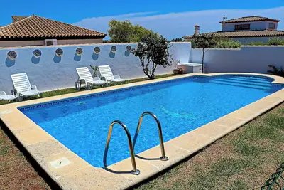 Image de Joli bungalow avec piscine commune