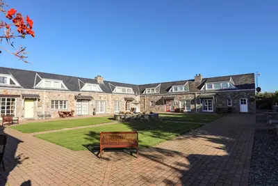 Image de Tyn Towyn - Ty Piws, avec un jardin dans la baie de Trearddur, Ref 1009068