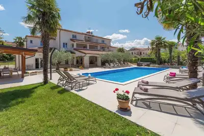 Image de Appartement de vacances avec l'utilisation de la piscine et la climatisation