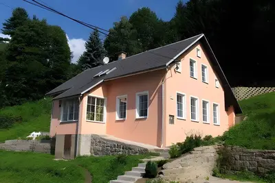 Image de Maison de vacances avec cheminée et sauna