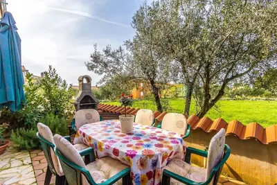 Image de Maison de vacances avec barbecue et terrasse