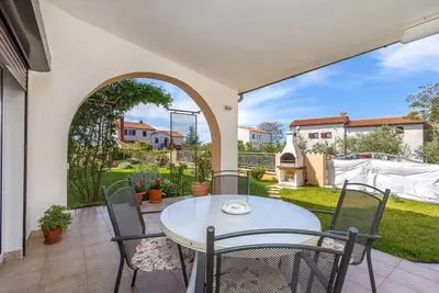 Image de Appartement de vacances avec jardin et barbecue