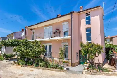 Image de Appartement de vacances avec jardin et barbecue