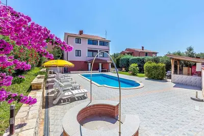 Image de Appartement de vacances avec piscine extérieure commune