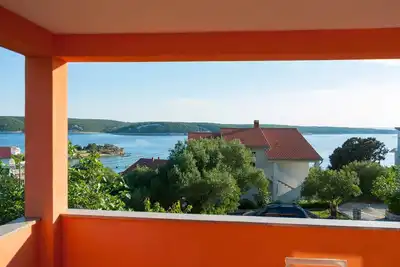 Image de Appartement de deux chambres avec la terrasse et la vue sur le mer Supetarska Draga - Gonar, Rab (A-16738-a)