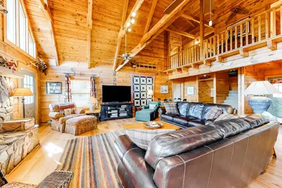 Image de Cabine isolée avec vue sur la montagne, bain à remous, foyer et billard!