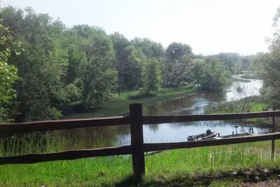 Image de Magnifique Lodge sur la rivière Big Manistee, avec cabines pour famille élargie.
