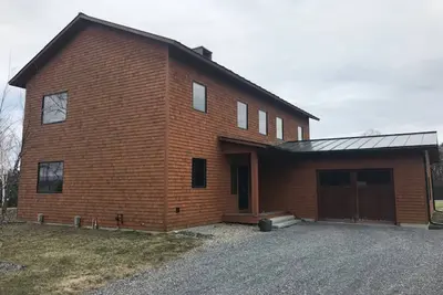 Image de Spacieuse maison de bord de mer w \/ vue phénoménale sur le lac, cheminée, et quai partagé