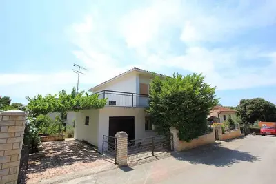 Image de Maison de vacances avec jardin et barbecue près de la plage