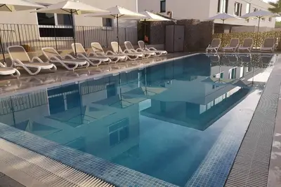 Image de Appartement confortable de deux chambres avec piscine 5