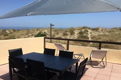 Image de Face à la mer, duplex 4 pièces avec une grande terrasse idéal pour les familles,
