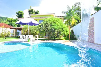 Image de Maison avec 3 suites, piscine dans un quartier résidentiel, jusqu'à 7 personnes