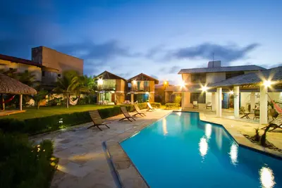 Image de Maison pour événements sur la plage avec des chalets indépendants au bord de Praia Aquiraz