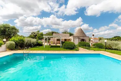 Image de Trullo Rampone, villa trulli avec piscine panoramique privée, jardin, Wi-Fi