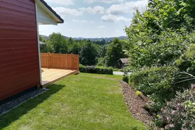 Image de Maison en bois moderne et confortable avec cuisinière